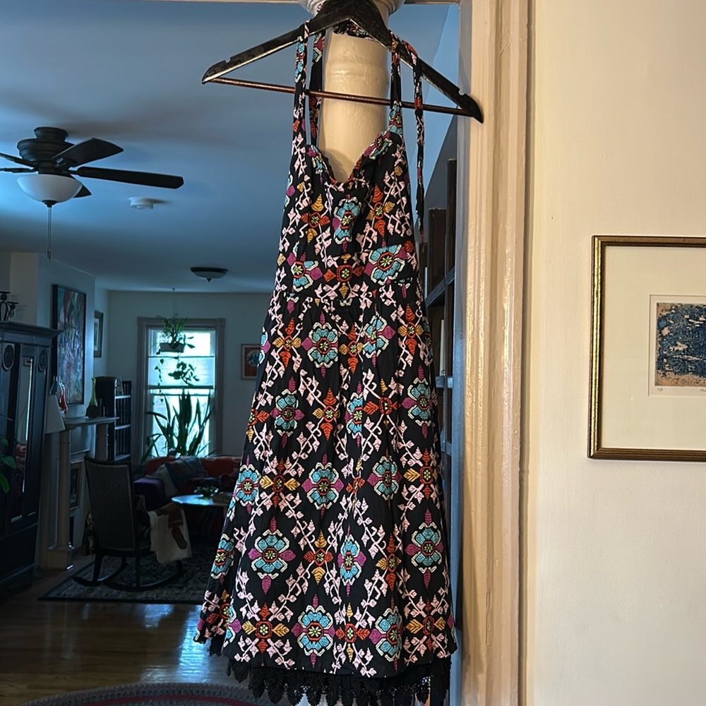 Boned sweetheart, halter top dress with lace hemming fringe.with pockets.